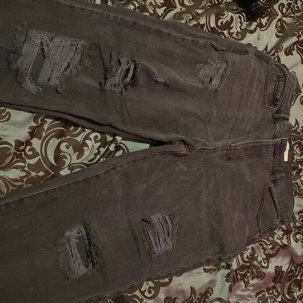 i’m selling dark grey pants with rips on them, from pacsun.